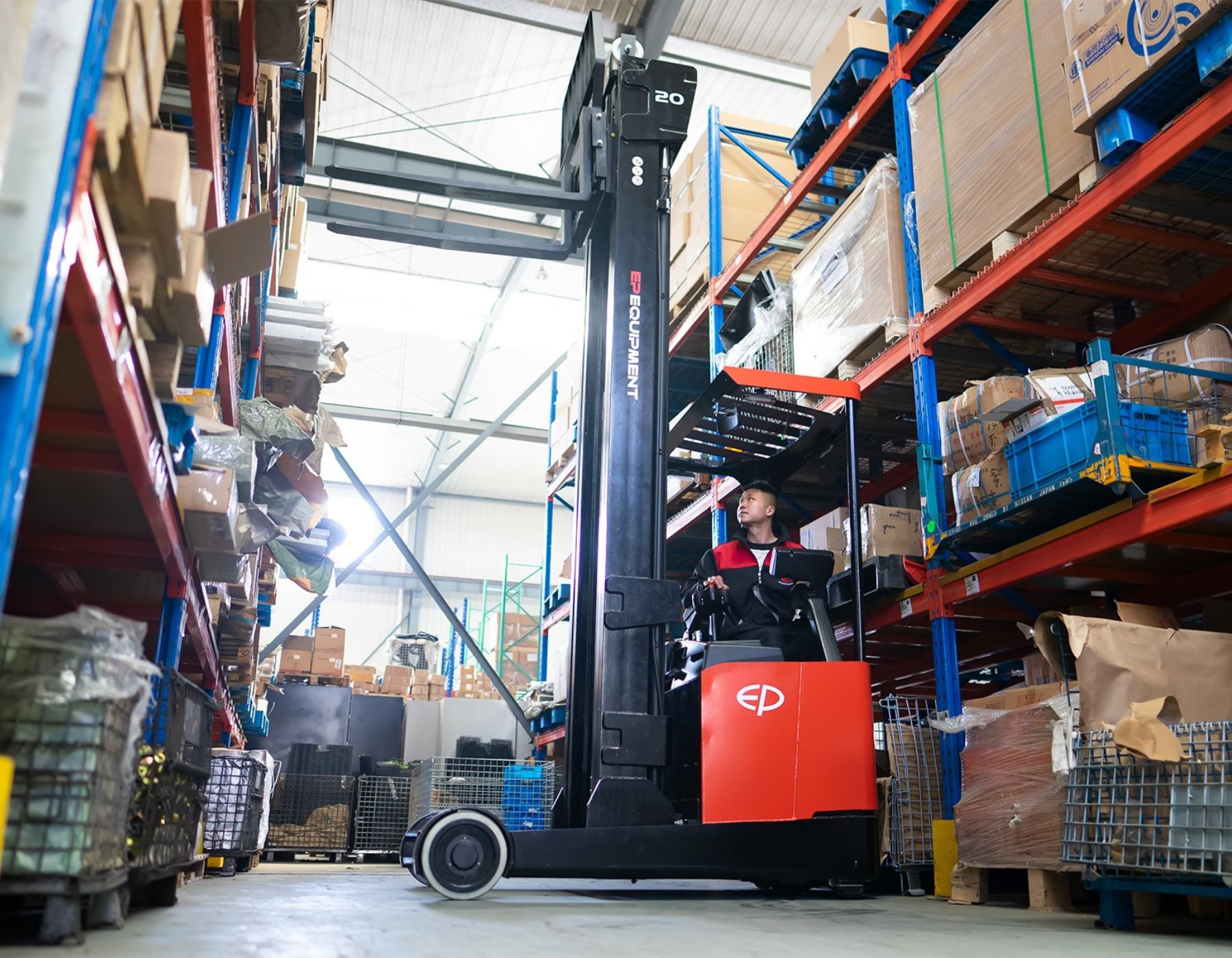 Red EP electric reach truck in a warehouse