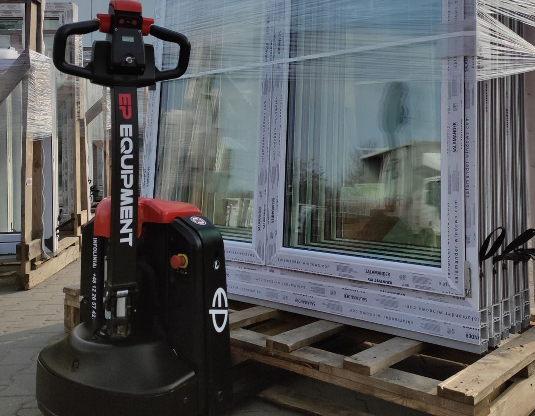 Side view of a red EP electric pallet truck labeled 'EPL1531 Li-ion