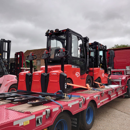 iLift truck delivering new forklifts to customers.