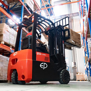 Warehouse worker operating a red EP electric forklift, lifting a pallet of boxes onto high blue shelves in a well-organized storage area, with sunlight streaming in from the roof.