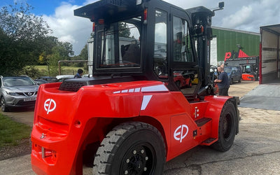 A bright red forklift with 