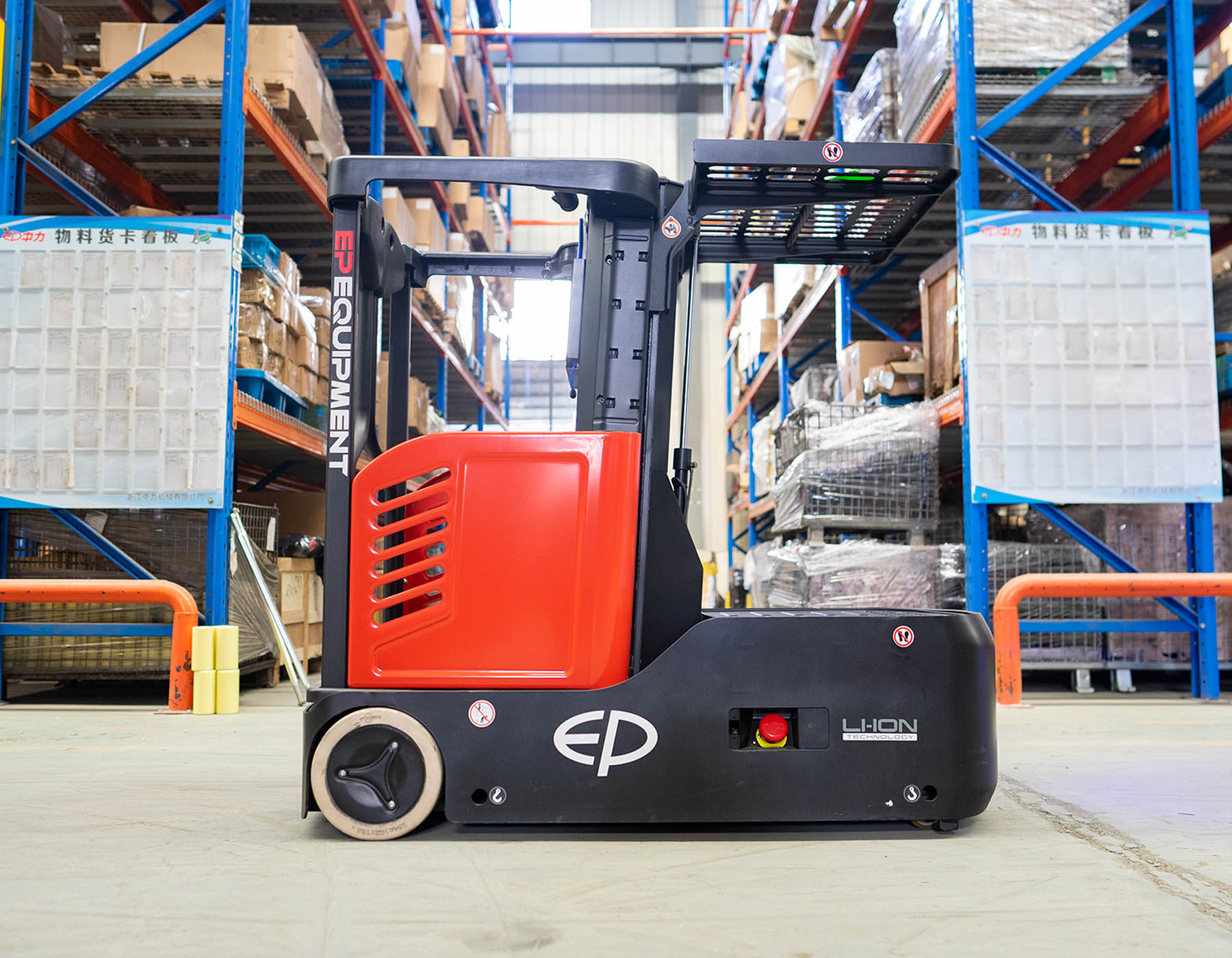 Front angled view of a red and black EP ESl122 electric stacker truck, featuring tall lifting masts and a compact handle design, positioned on a white background