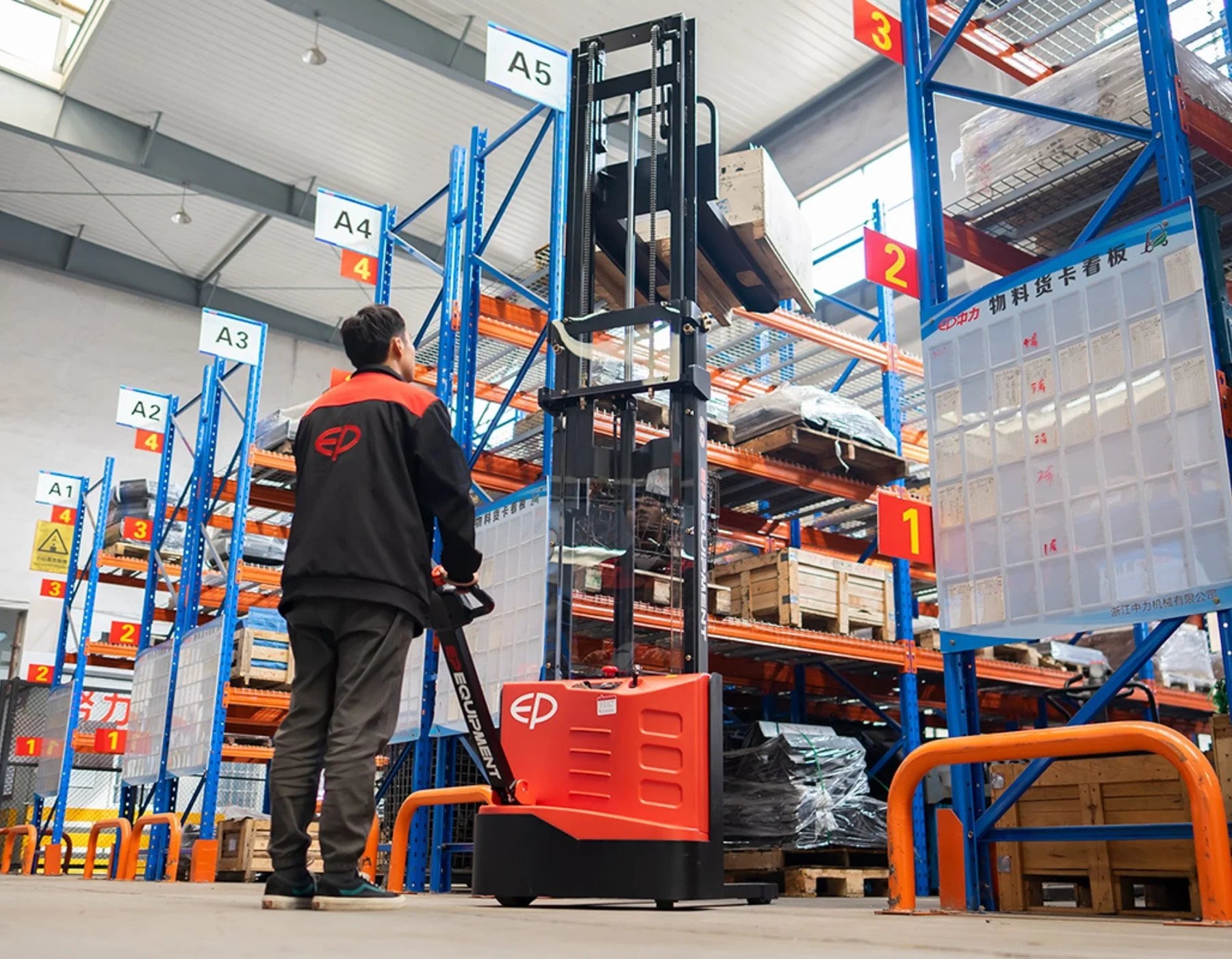 Warehouse worker in an EP-branded jacket operating a red electric pallet stacker, navigating organized blue shelving marked with location labels, in a spacious and well-lit warehouse.